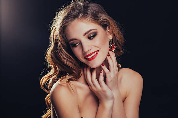 Perfect model with the divine makeup in the Studio. Perfect model with the divine makeup in the Studio on a black background. The minor model. beautiful polish girls stock pictures, royalty-free photos & images