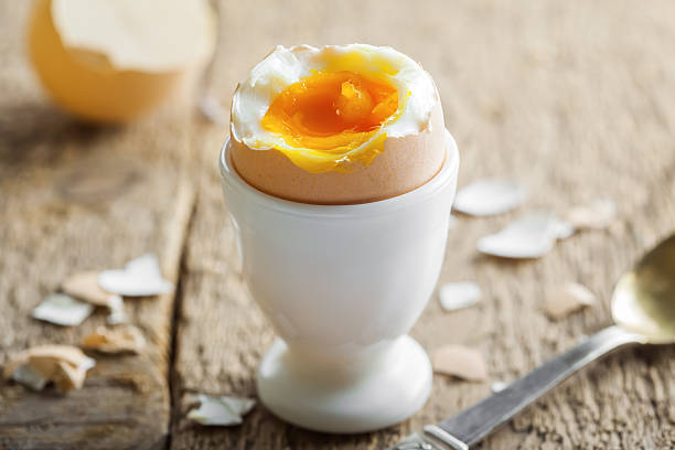 Perfect soft boiled egg for breakfast Traditional breakfast with perfect soft boiled egg . International cuisine food. boiled egg stock pictures, royalty-free photos & images