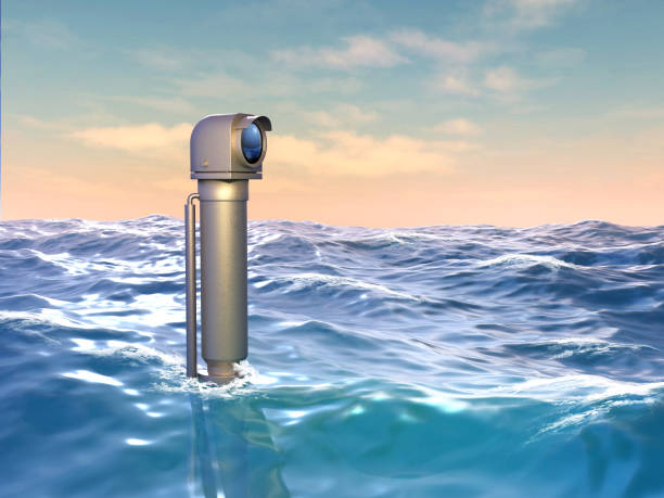 Periscope emerging from the sea surface stock photo