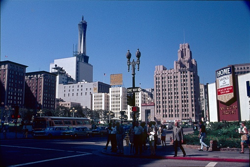Los Angeles, California, USA, 1968. Street Scene at Pershing Square, seen from the S Hill St. corner W 6th St. Pedestrians, traffic, buildings and cars.
