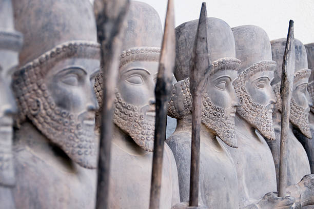 Persian warriors in line Lined up Persian warrior statues in Tehran, Iran. empire stock pictures, royalty-free photos & images