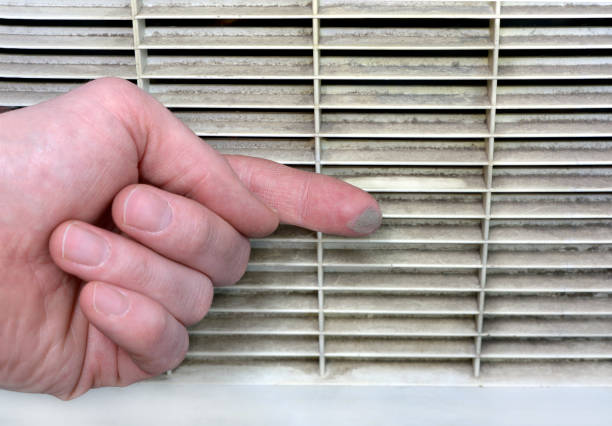 Person checks the contamination of the ventilation grille Person checks the contamination of the ventilation grill by swiping a finger along it unhygienic stock pictures, royalty-free photos & images