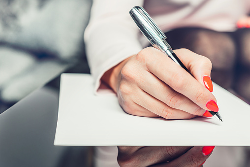 Person Sign Document Write On Paper Using Pen Stock Photo - Download Image  Now - iStock