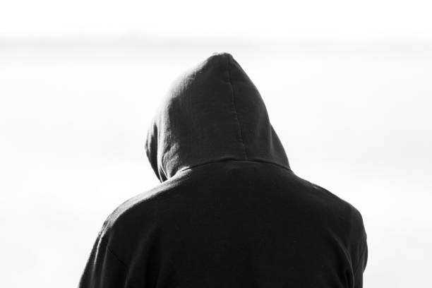 Person wearing hoodie stock photo
