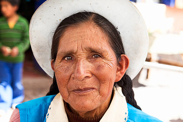 Peruvian woman portrait "Indian woman selling food in Pisac, The Sacred Valley, Peru" peru woman stock pictures, royalty-free photos & images