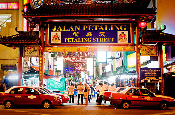 Petaling Street Kuala Lumpur, Malaysia - March 30, 2011: Petaling Street or known as Chinatown among tourists is the centre of Kuala Lumpur\'s original Chinatown. The street is also affectionately known as PS among locals central market kuala lumpur stock pictures, royalty-free photos & images