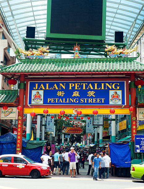Petaling Street Kuala Lumpur, Malaysia - March 20, 2011: Petaling Street in Kuala Lumpur . The street is a long market which specialises in counterfeit clothes, watches and shoes. Famous tourist attraction central market kuala lumpur stock pictures, royalty-free photos & images