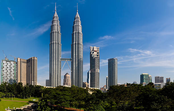 Petronas twin Towers Malaysia Petronas Towers in Kuala Lumpur, Malaysia petronas towers stock pictures, royalty-free photos & images