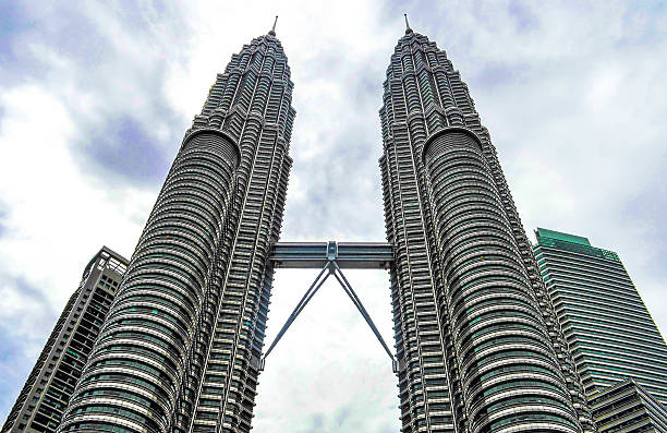 Petronas Twin Towers Petronas Twin Towers in Kuala Lumpur, Malaysia petronas towers stock pictures, royalty-free photos & images