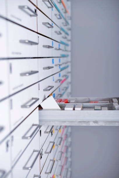 pharmacy cabinet from side of drawers stock photo