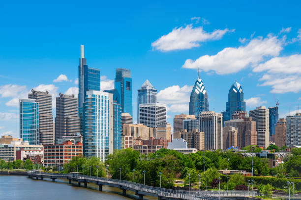 Philadelphis Philadelphia downtown skyline with blue sky and white cloud urban skyline stock pictures, royalty-free photos & images