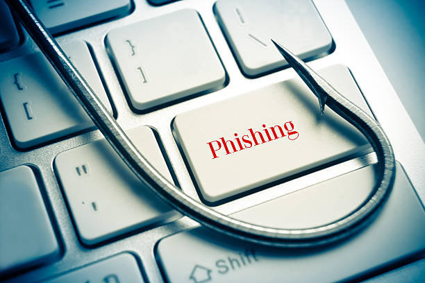 phishing phishing / a fish hook on computer keyboard with email sign / computer crime / data theft / cyber crime phishing stock pictures, royalty-free photos & images