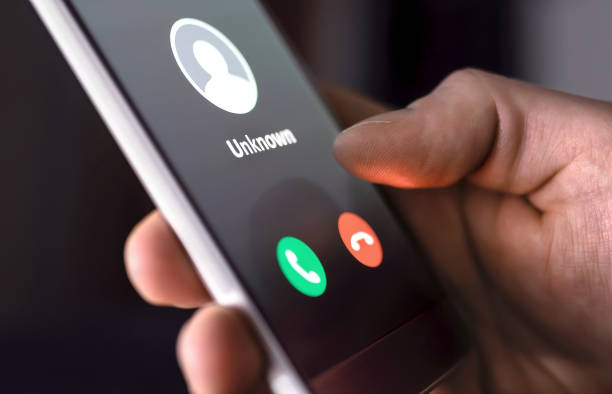 phone call from unknown number late at night. scam, fraud or phishing with smartphone concept. prank caller, scammer or stranger. man answering to incoming call. - phone imagens e fotografias de stock