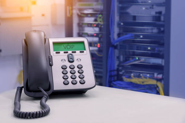 VOIP Phone (IP Phone) in data center room VOIP Phone (IP Phone) in data center room voip stock pictures, royalty-free photos & images