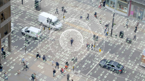 Phone signal in a data matrix city. Visualization of a radio signal coming from a mobile phone in a data filled scene. surveillance photos stock pictures, royalty-free photos & images