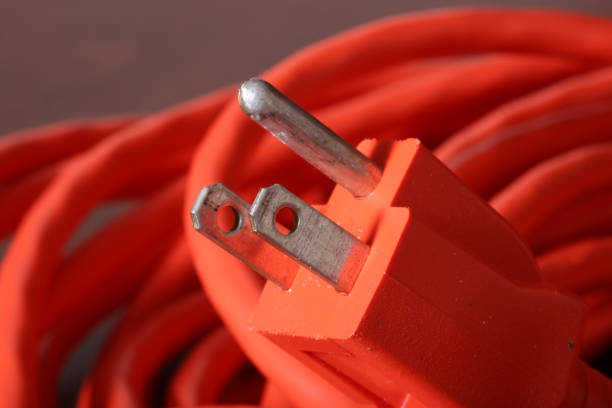 Phot depicts the three prong connector to a extension cord stock photo