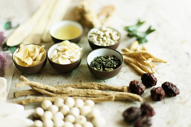 Photo of dried herbs, shaved nuts and other preserved foods  stock photo
