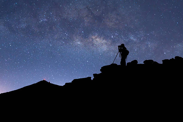 Photographer, stars and Milky Way stock photo