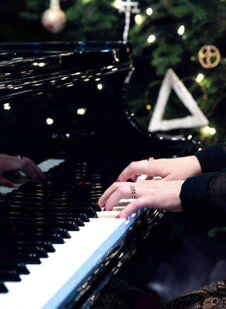 Piano Hands & Christmas Tree 1 stock photo