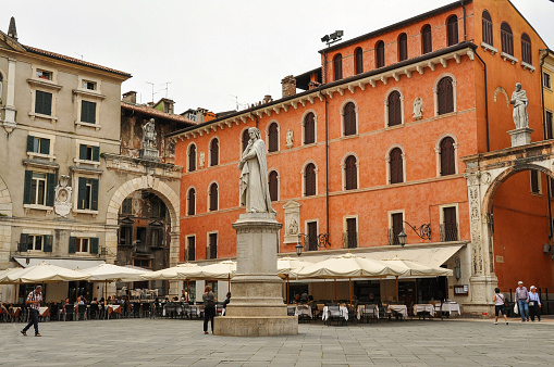 Verona, Italy - June 16, 2014: Piazza dei Signori in Verona. Verona is a city on the Adige river in Veneto, Italy. It is one of the seven provincial capitals of the region. It is the second largest city municipality in the region and the third largest in northeast Italy
