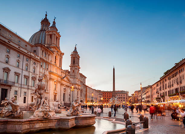 Piazza Navona, Rome - Italy Fountain of the Four Rivers and  the church of Sant'Agnese in Agone in  Piazza Navona. city break stock pictures, royalty-free photos & images