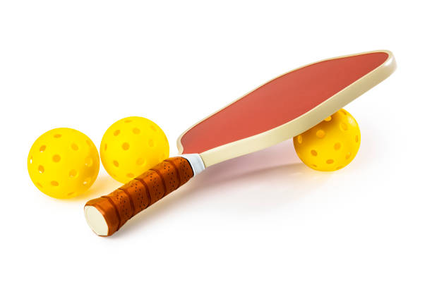 Pickleball Paddle and Balls Isolated on a White Background stock photo