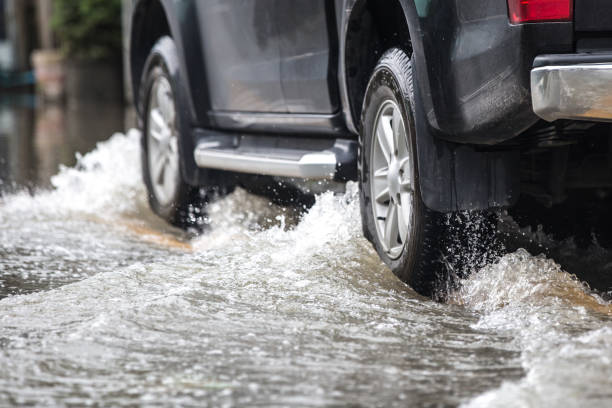 Pickup truck on a flooded street stock photo