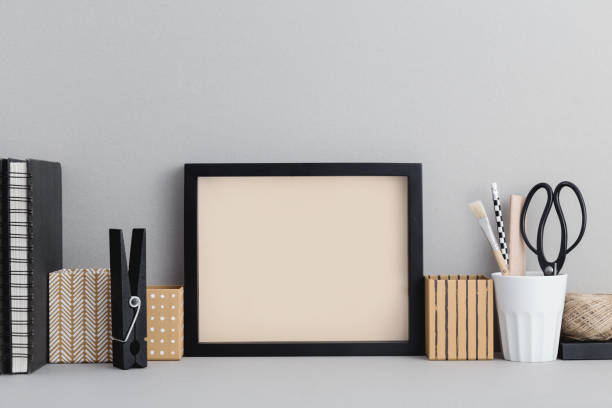 Picture frame isolated on bookshelf or home office desk. Mock up. Picture frame isolated on bookshelf or home office desk. Mock up. desk photos stock pictures, royalty-free photos & images