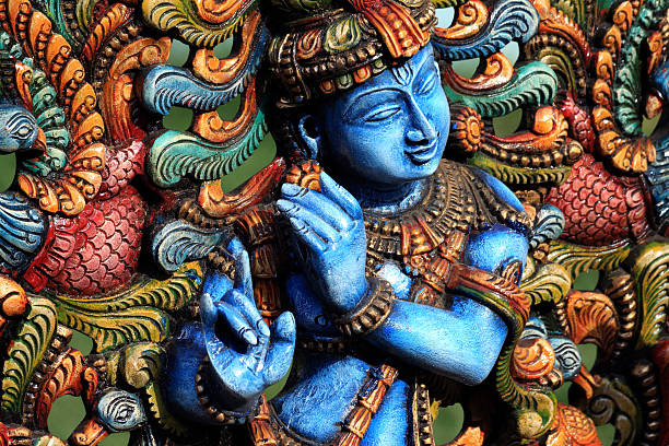 Picture of a wall at temple of Lord Krishnan Wooden Statue of lord krishna vishnu stock pictures, royalty-free photos & images