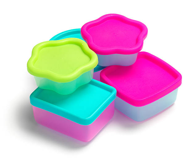 A picture of five different shaped plastic containers stock photo