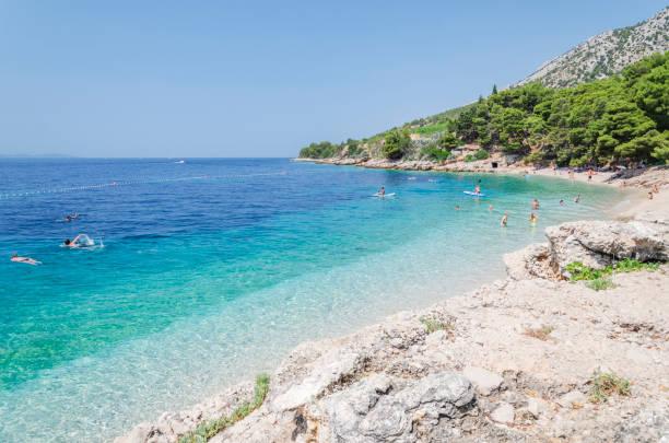 Picturesque pebble beach in Murvica village on the south coast of Brac island in Croatia stock photo