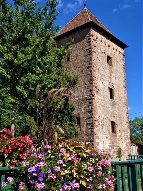 Picturesque tower of the old city wall of Wissembourg Picturesque tower of the old city wall of Wissembourg, France bas rhin stock pictures, royalty-free photos & images