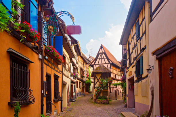 Picturesque Village Eguisheim in Alsace, France Picturesque Village Eguisheim in Alsace, France riquewihr stock pictures, royalty-free photos & images