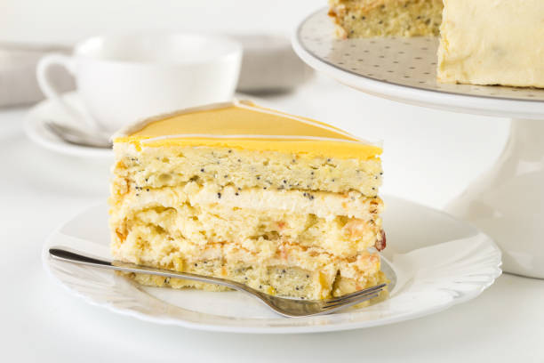 Piece of delicious lemon dessert cake stock photo