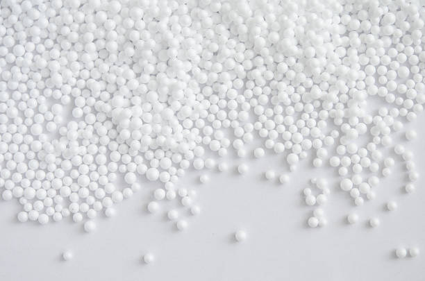 pieces of foam plastic like snow balls - polystyreen stockfoto's en -beelden