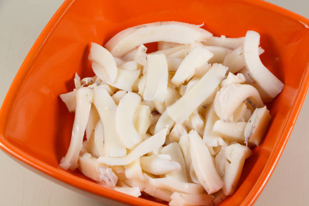 Pieces of squid in a bowl stock photo