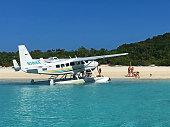 istock Pig Beach Float Plane 1193751680