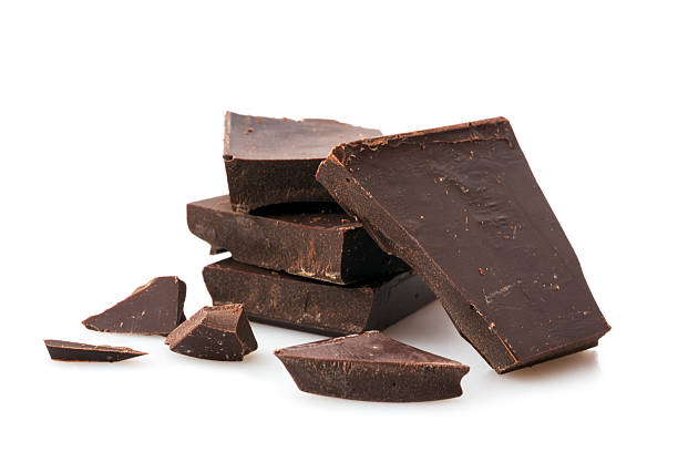 A pile of chunked dark chocolate  stock photo