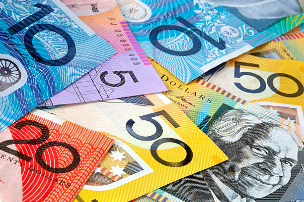 A pile of colorful Australian banknotes stock photo