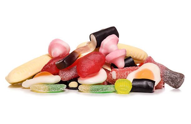pile of pick and mix sweets pile of pick and mix sweets studio cutout pick and mix stock pictures, royalty-free photos & images