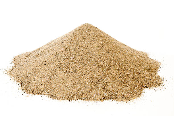 Pile of sand Pile of sand isolated on white sand stock pictures, royalty-free photos & images