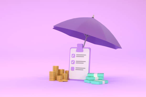 Piles of golden coins and banknotes under purple umbrella. stock photo