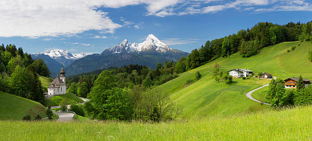 Pilgrimage Church Maria Gern with Watzmann in background Maria Gern Church in Bavarian Alps on Mountain Panorama view bavaria stock pictures, royalty-free photos & images