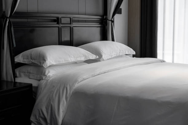 Pillows on hotel beds stock photo