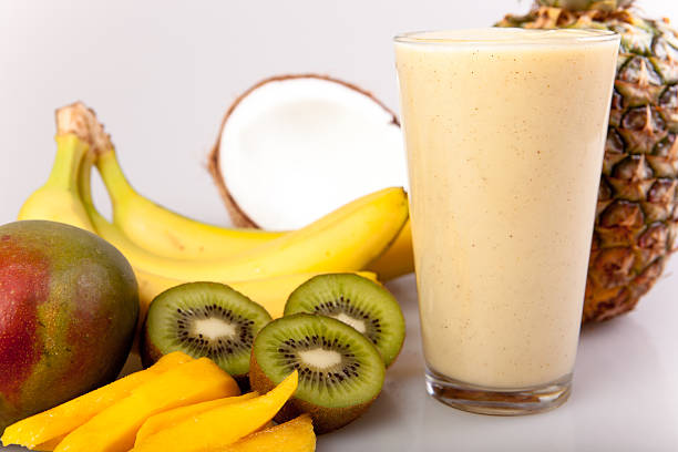 Pineapple, coconut, fruit smoothie Fresh fruit smoothie mango smoothie stock pictures, royalty-free photos & images