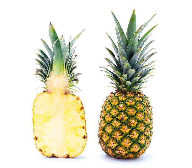 Pineapple Pineapple on white background aluxum stock pictures, royalty-free photos & images