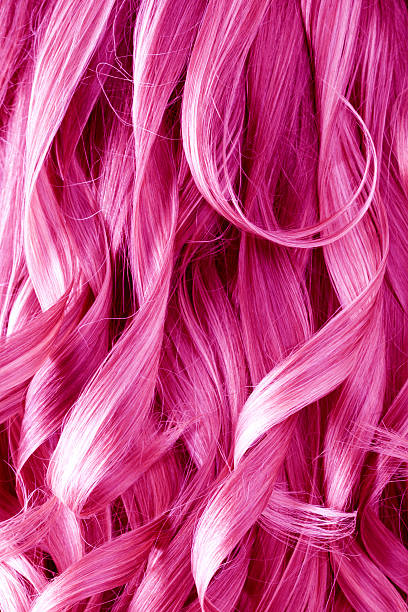 Pink Curly Hair Background Pink Curly Hair Background. pink hair stock pictures, royalty-free photos & images