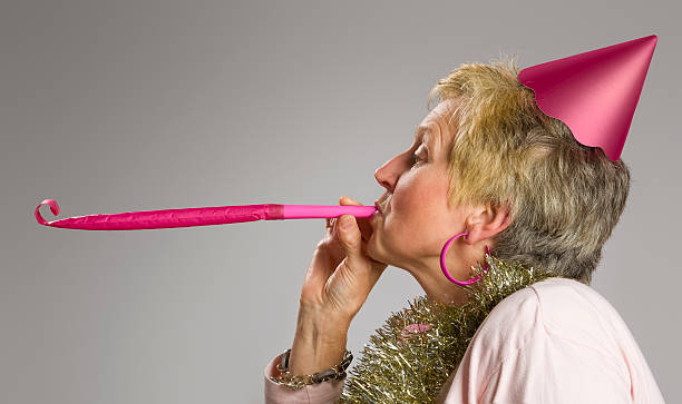 Pink party blower stock photo