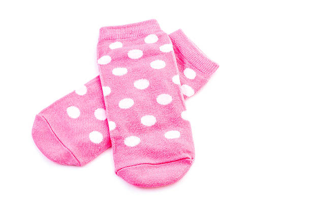 Pink polka sock stock photo