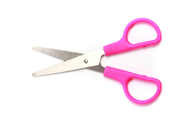 Pink scissors isolated on white background Pink scissors isolated on white background scissors stock pictures, royalty-free photos & images